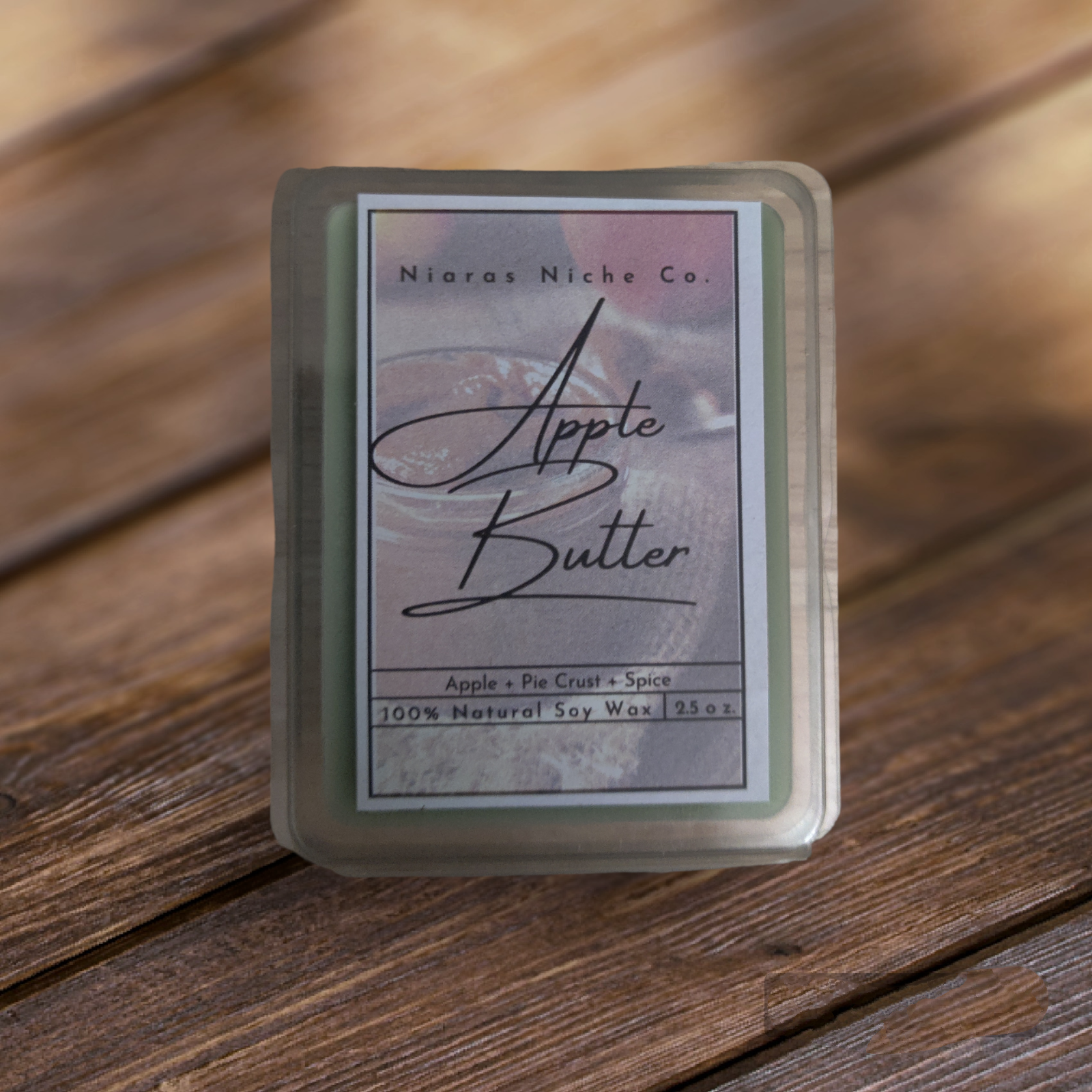 Niaras Niche Co. Apple Butter wax melt, 25 oz. featuring scents of apple, pie crust, and spice, made from 100% natural soy wax.