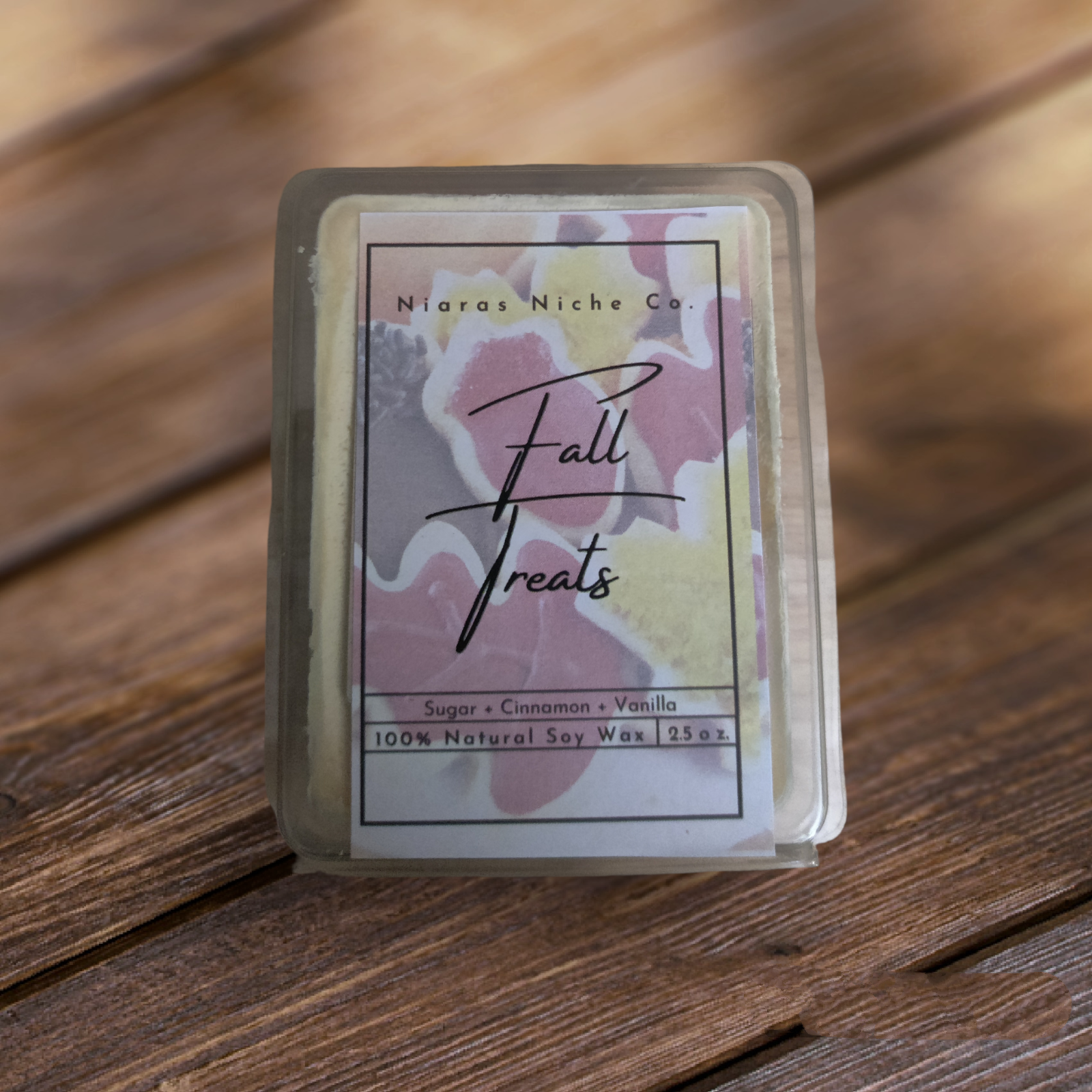 Niaras Niche Co. Fall Treats soy wax melts, 2.5 oz. Scented with sugar, cinnamon, and vanilla in a clear plastic container.